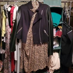 Faux leather moto jacket zipper detail